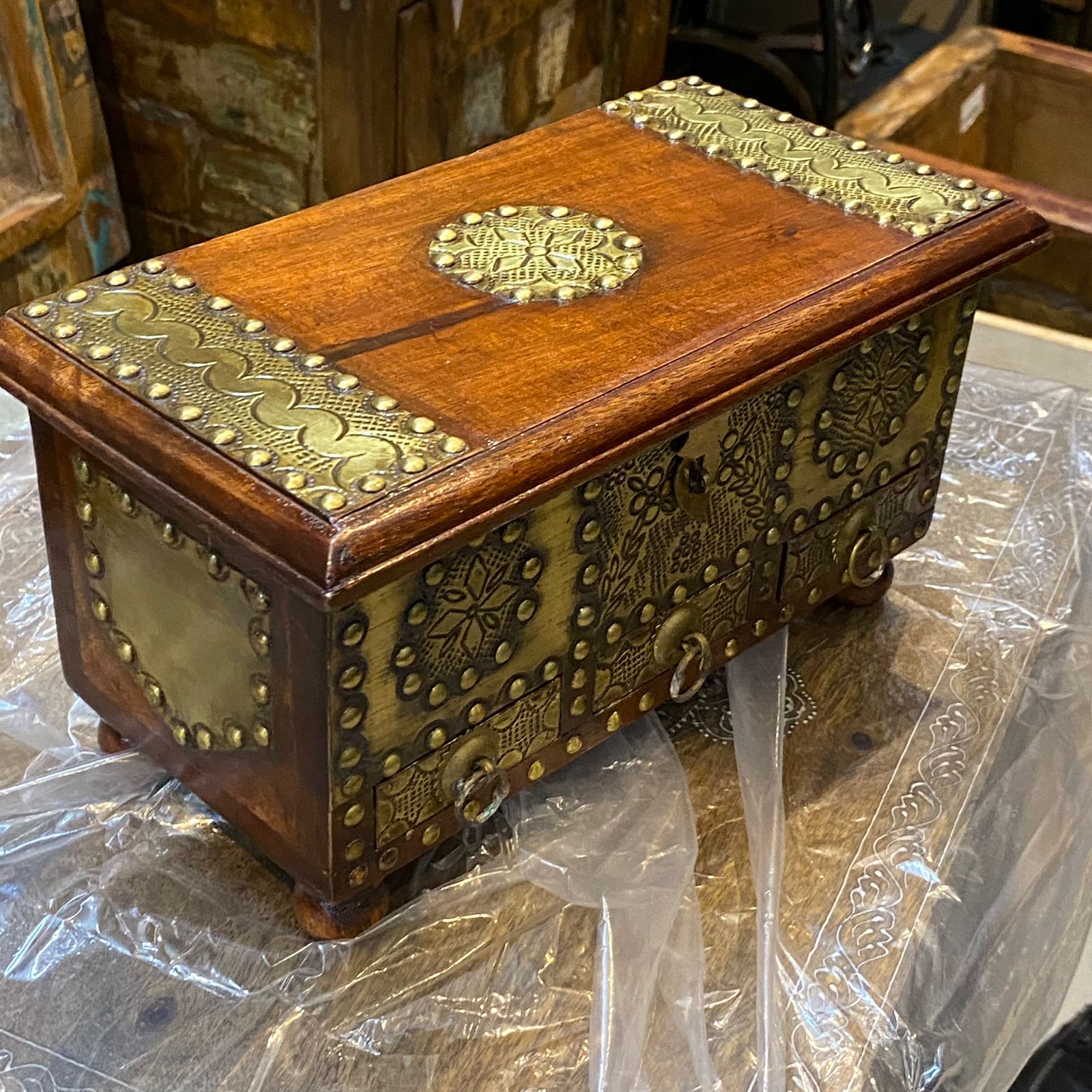 Mini wooden chest of drawers with fine brass work