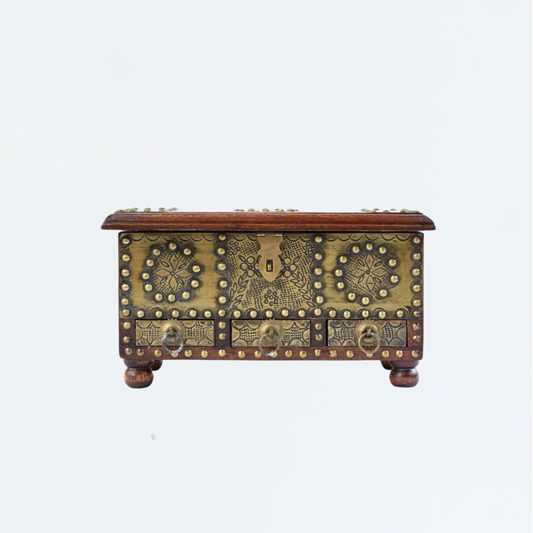 Mini wooden chest of drawers with fine brass work